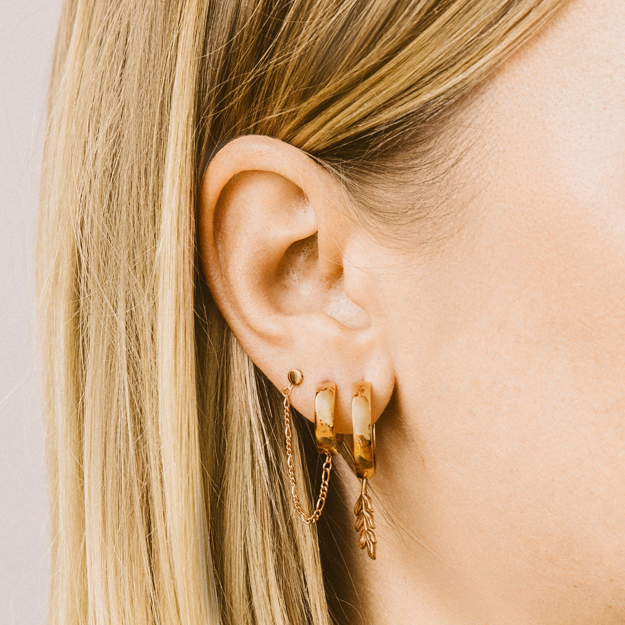 Wandelbare Ohrringe mit wechselbaren Anhängern